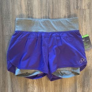REI women’s fleet short with spandex shorts